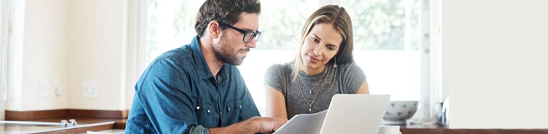 Image of couple reviewing homeowners insurance